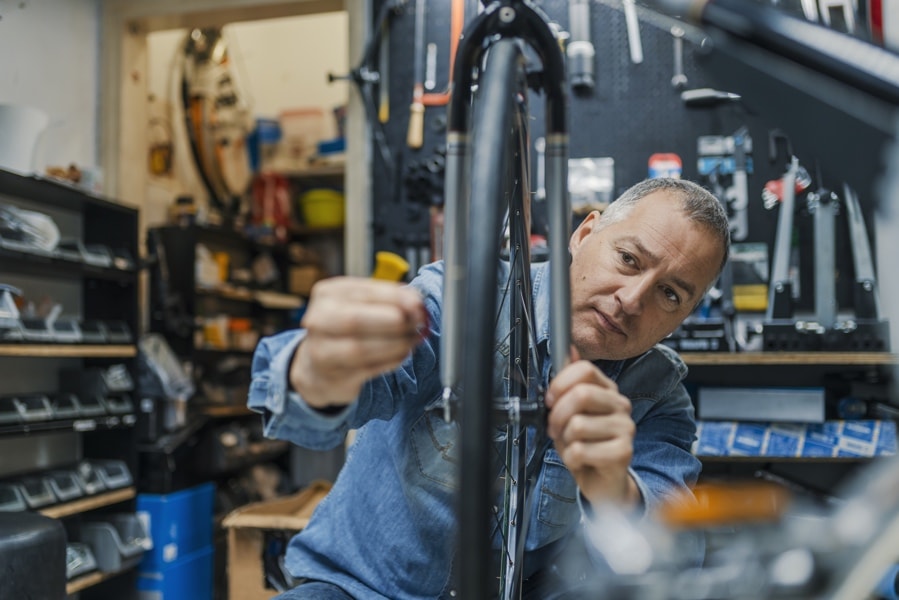 Man working in a bike repair shop